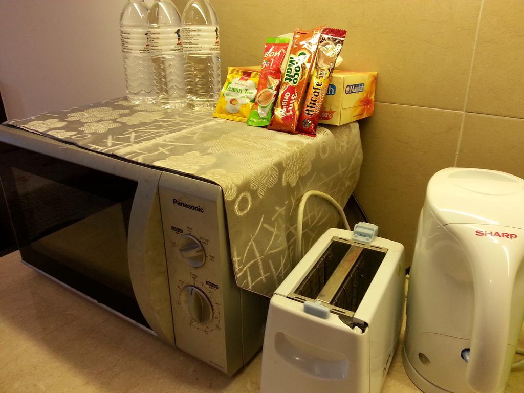 ホテル ベスト スタジオ ゲスト ハウス コタバル 部屋 写真